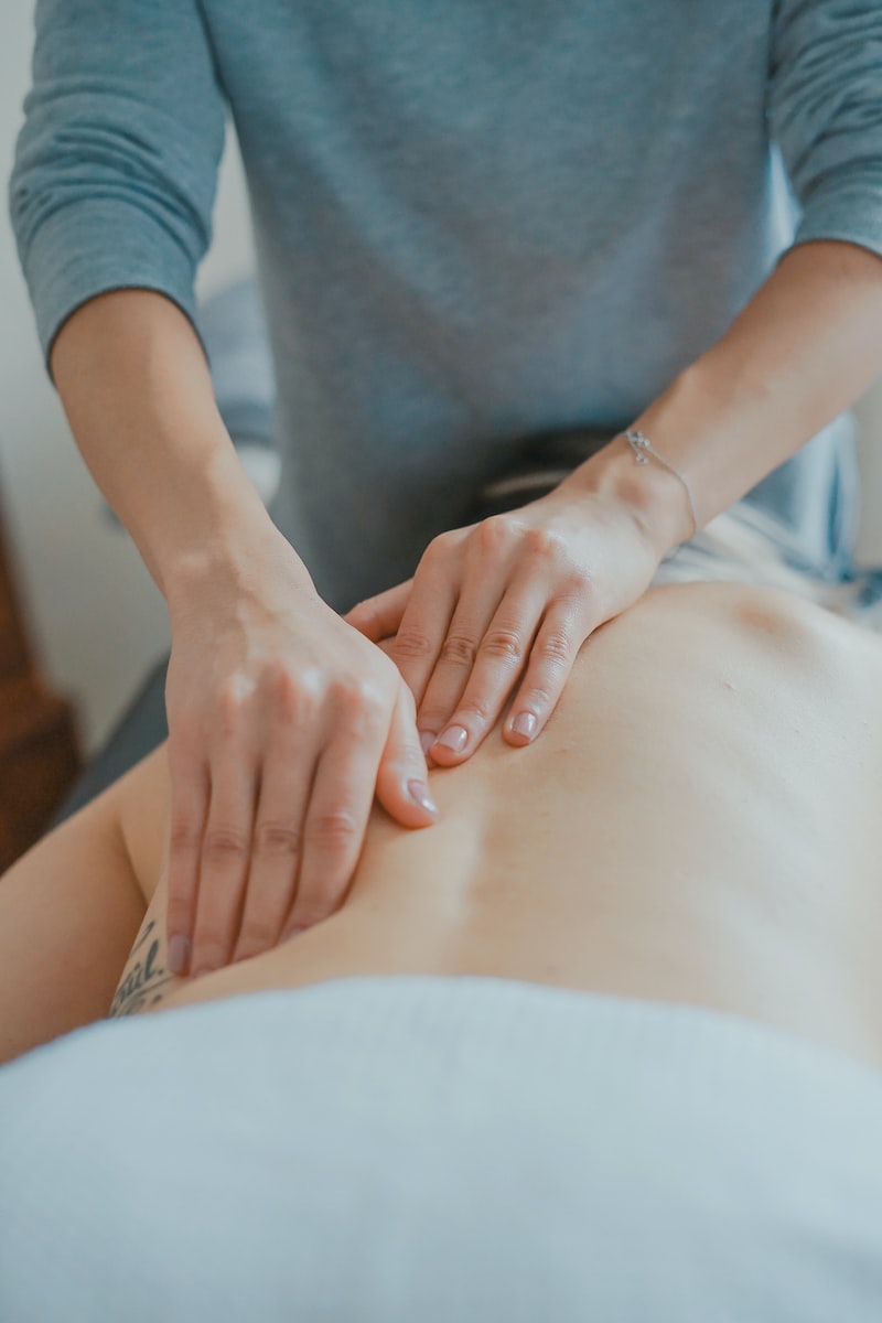 Therapist performing hands-on massage