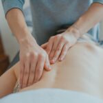 Photo by Toa Heftiba man massaging woman's body